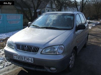 /  KIA Carens  
